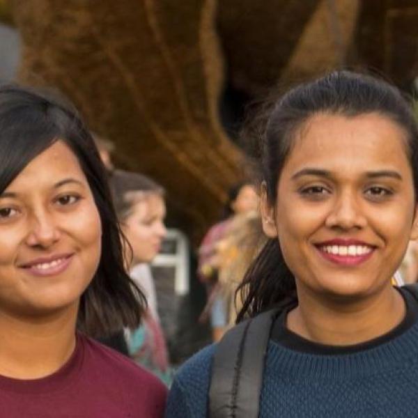 Three women smiling