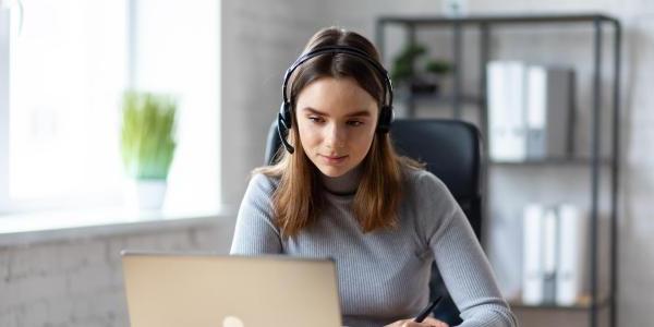 young person taking a webinar