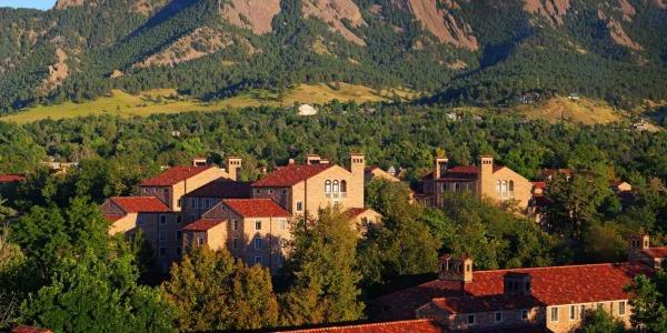 campus buildings and the Flatirons