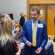 CU President Todd Saliman speaks with leaders at a quantum workforce development event