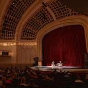 Person speaking in Macky Auditorium