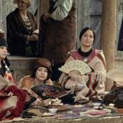 A photo showing several actors in the movie 'Killers of the Flower Moon'. The actors are portraying Indigenous women of the Osage Nation in the 1920s. 