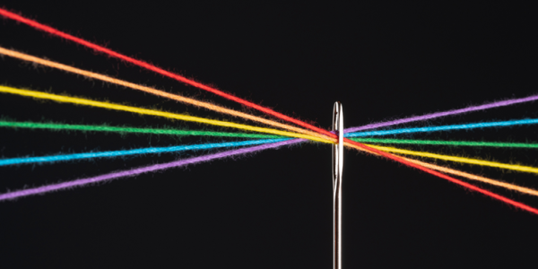 Multicolor threads combined in the eye of a needle